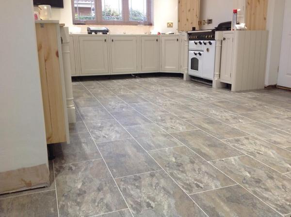 Has anyone fitted vinyl tiles with 'grouting strips' themselves?
