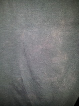 What are these bleach like stains on my clothes? (Pics)