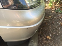 Apparently I scratched someone's car.  Advice please?