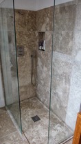 Walk-in shower (tiled floor as opposed to shower tray)