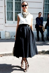 What top could I wear with a black a line midi?