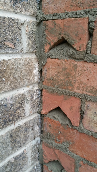 The builders have used orange bricks for the new porch when our house bricks are beige/greyish