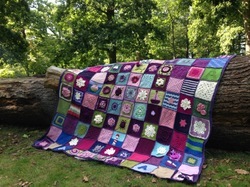 Woolly Hugs. For our own Beccajo. Lovely donors and crafters, please, your help is needed.