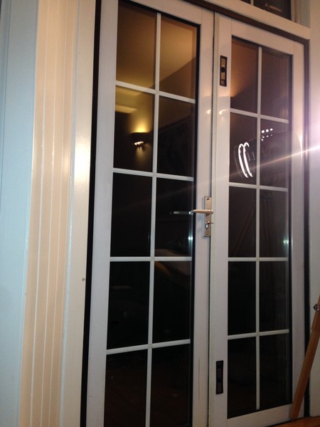 would it be possible do you think, to fit a dog flap in this door? (pic)