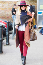 How do you wear a cape?? Are they flattering? Larger chest advice please!