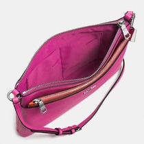 A cross between a purse and a handbag...