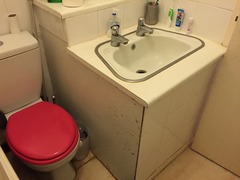 Stair bulkhead taking up space in tiny bathroom