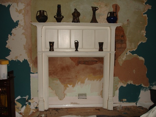 Crappy fireplace with log burner (photo included) - is this quote to improve it realistic?