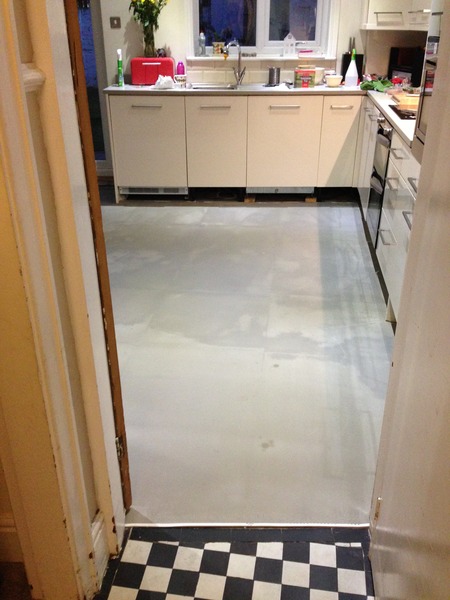 Which way would you lay the floor in my kitchen?