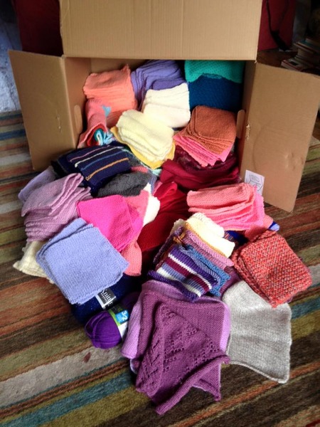 Woolly Hugs. Our Project to help refugees continues. One square, one blanket, a pair of gloves, one warm hat, one step at a time, really every little thing will help. All support welcome.