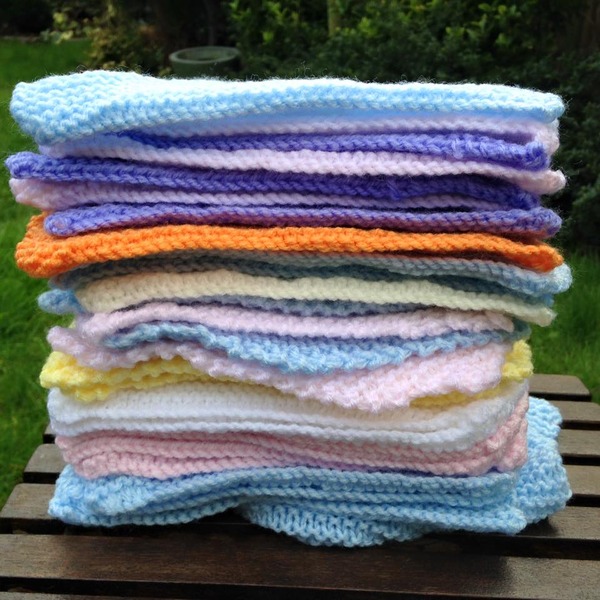 Woolly Hugs. Our Project to help refugees continues. One square, one blanket, a pair of gloves, one warm hat, one step at a time, really every little thing will help. All support welcome.