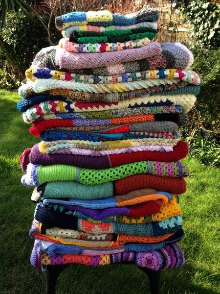 Woolly Hugs. Our Project to help refugees continues. One square, one blanket, a pair of gloves, one warm hat, one step at a time, really every little thing will help. All support welcome.