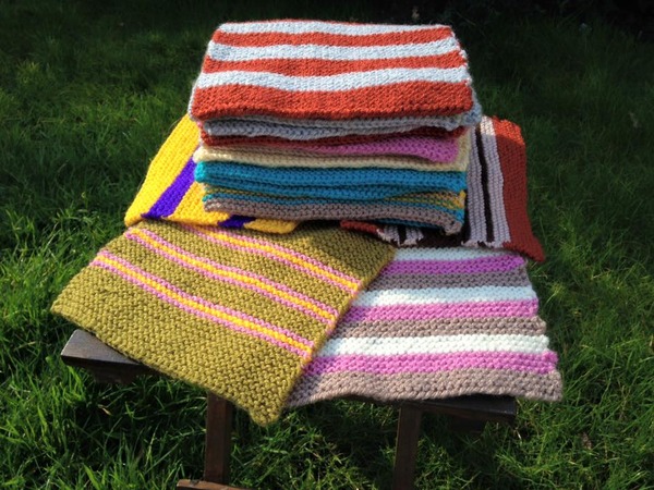 Woolly Hugs. Our Project to help refugees continues. One square, one blanket, a pair of gloves, one warm hat, one step at a time, really every little thing will help. All support welcome.