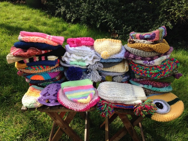 Woolly Hugs. Our Project to help refugees continues. One square, one blanket, a pair of gloves, one warm hat, one step at a time, really every little thing will help. All support welcome.