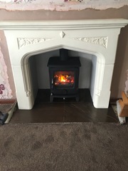 How much would it cost to have a wood burning stove fitted?