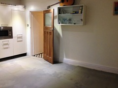 Which way would you lay the floor in my kitchen?