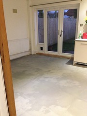 Which way would you lay the floor in my kitchen?