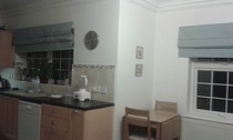 Ideas for paint schemes and curtains/blinds to update this country kitchen?