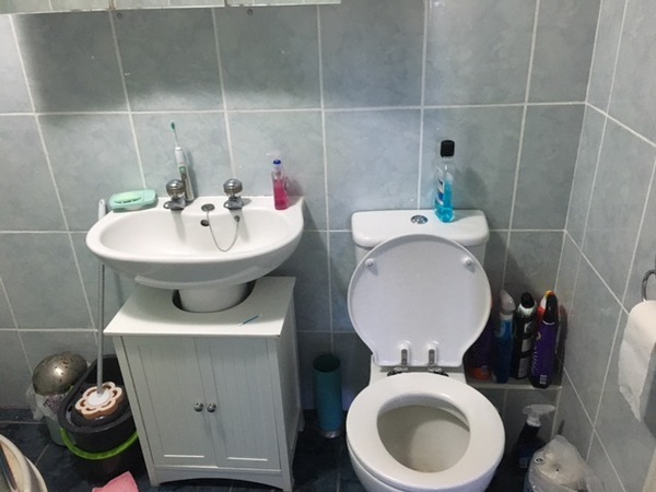 Replacing bathroom sink without removing the tiles?