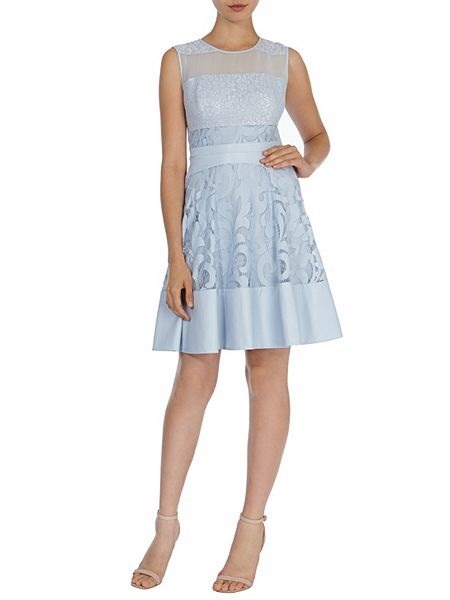 Would this be a suitable dress for a wedding guest dress, if so what could I put with it ?