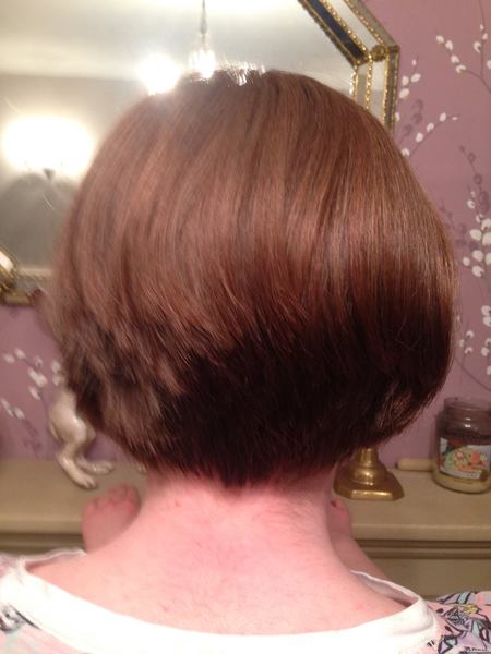 Should I chop off some of my daughters bobbed hair myself? The back is annoying me.