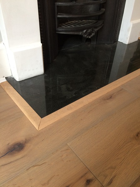 Edging for flooring around fireplace
