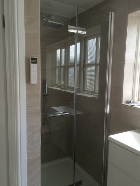 Photos of 2 new bathrooms