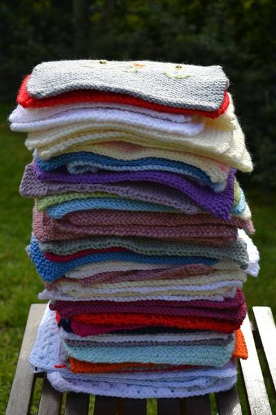 Woolly Hugs. Our Project to help refugees continues. One square, one blanket, a pair of gloves, one warm hat, one step at a time, really every little thing will help. All support welcome.