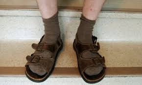 What does your DH/DP wear on his feet when wearing shorts?