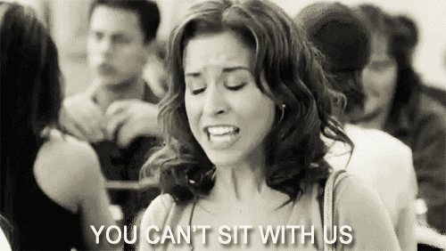 To tell a friend to sit somewhere else