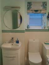 Photos of 2 new bathrooms