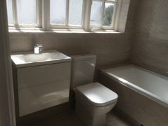 Photos of 2 new bathrooms