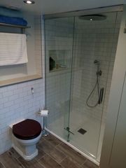 Photos of 2 new bathrooms