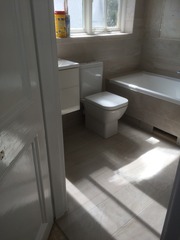 Photos of 2 new bathrooms