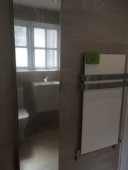 Photos of 2 new bathrooms