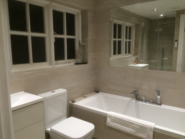 Photos of 2 new bathrooms