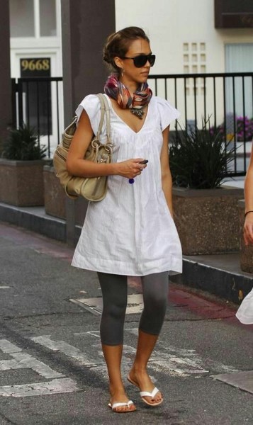 are dresses with black leggings unfashionable?