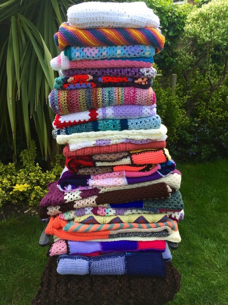 Woolly Hugs. Our Project to help refugees continues. One square, one blanket, a pair of gloves, one warm hat, one step at a time, really every little thing will help. All support welcome.