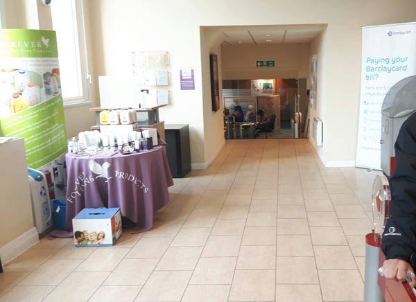 To be annoyed that there is a forever living stand in my bank?