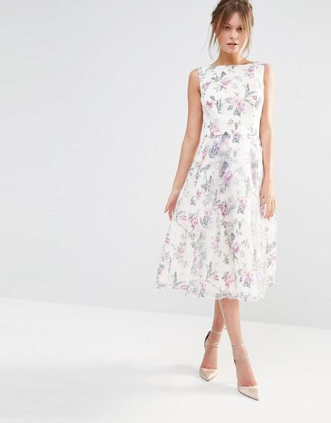 Is this dress too pale and therefore too bridal to attend a wedding as a guest?