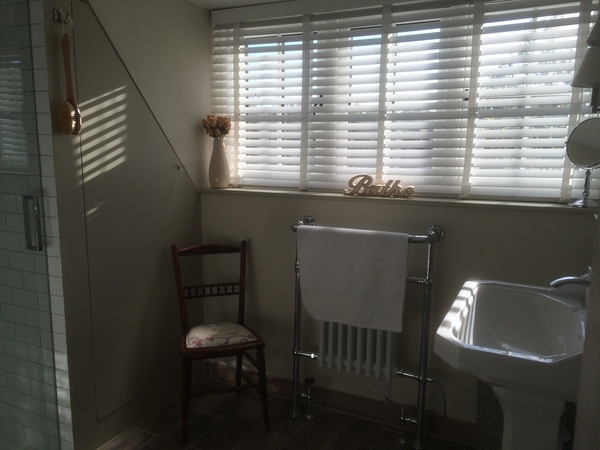 Photos of 2 new bathrooms