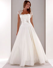 do you look at your wedding photos and wish you'd worn something else..