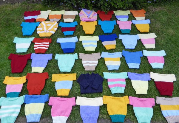 Woolly Hugs. Our Project to help refugees continues. One square, one blanket, a pair of gloves, one warm hat, one step at a time, really every little thing will help. All support welcome.