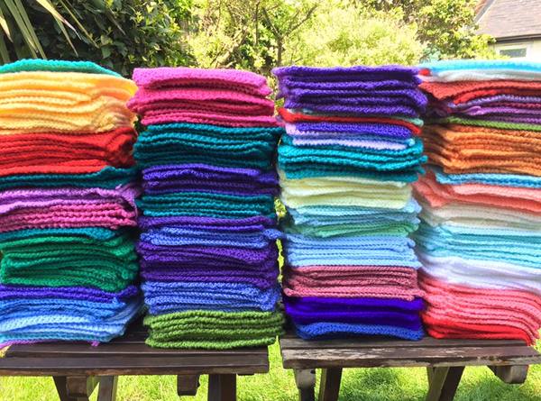 Woolly Hugs. Our Project to help refugees continues. One square, one blanket, a pair of gloves, one warm hat, one step at a time, really every little thing will help. All support welcome.