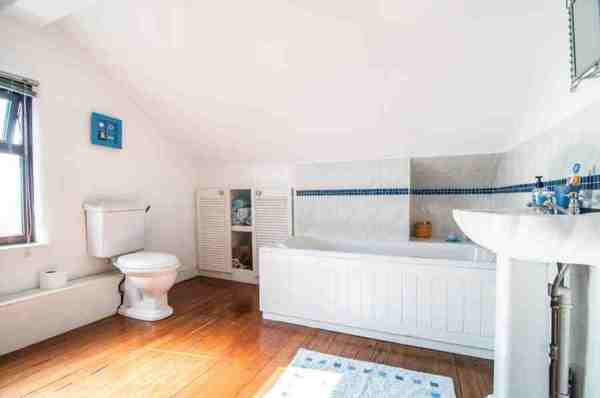 Wooden flooring in bathroom