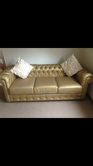Why oh why....a gold sofa!