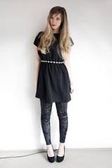 are dresses with black leggings unfashionable?