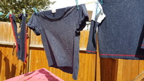 Nappy accidentally in washing machine - dark wash.. Agh!
