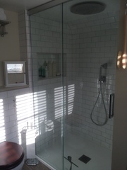 Photos of 2 new bathrooms