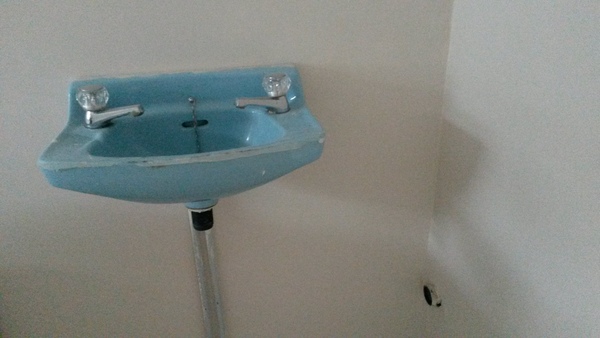 Is this a sink in a bedroom?